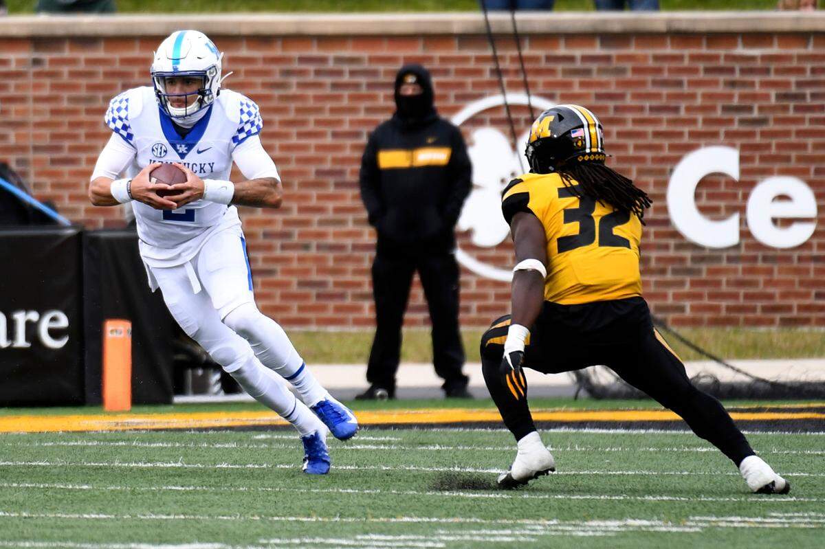 Kentucky quarterback Joey Gatewood, left, ran for 6 total yards and threw for 12 in relief of Terry Wilson during UK’s 20-10 loss at Missouri on Saturday.