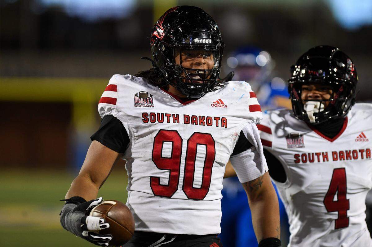 South Dakota Coyote defense line Mi'Quise Grace (90) celebrates getting the touchdown on Saturday, Oct. 26, 2024, at Dana J. Dykhouse Stadium in Brookings, South Dakota.