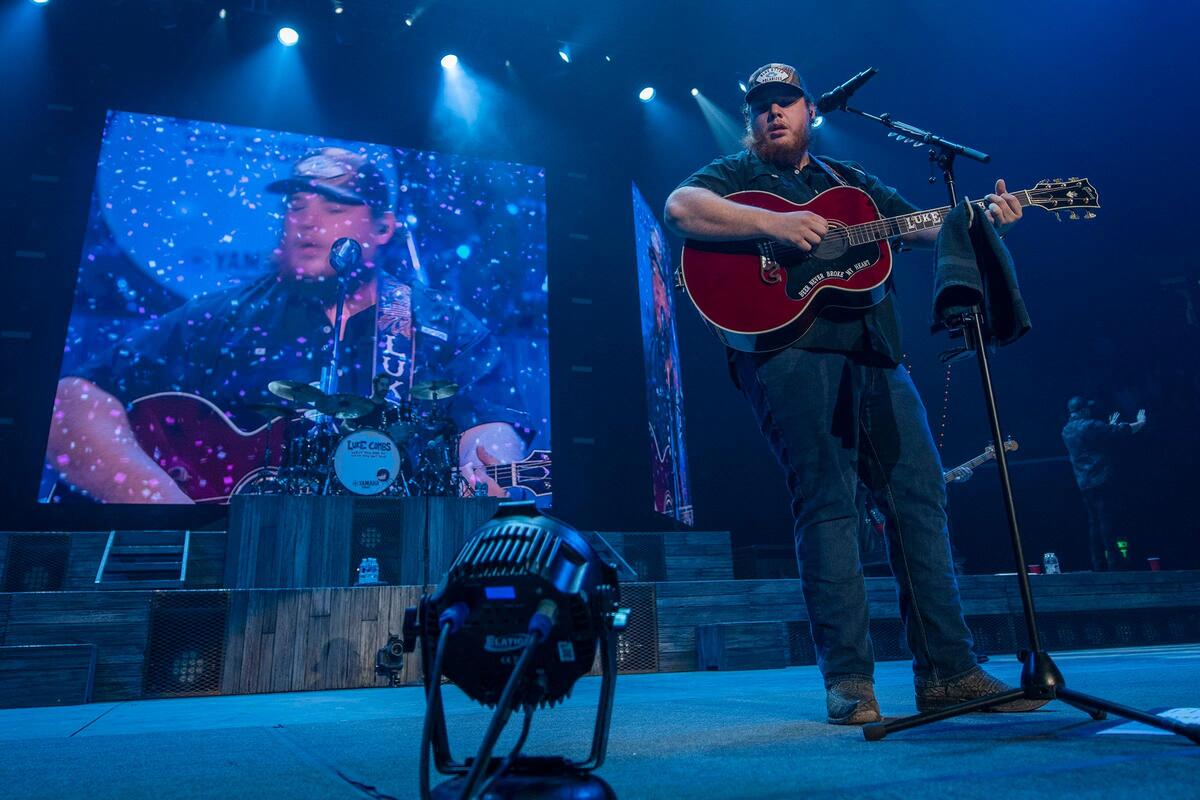 Luke Combs' Friday Rupp Arena concert played out on a largely bare stage backed by three huge video screens serving as the only luxury items.&nbsp;
