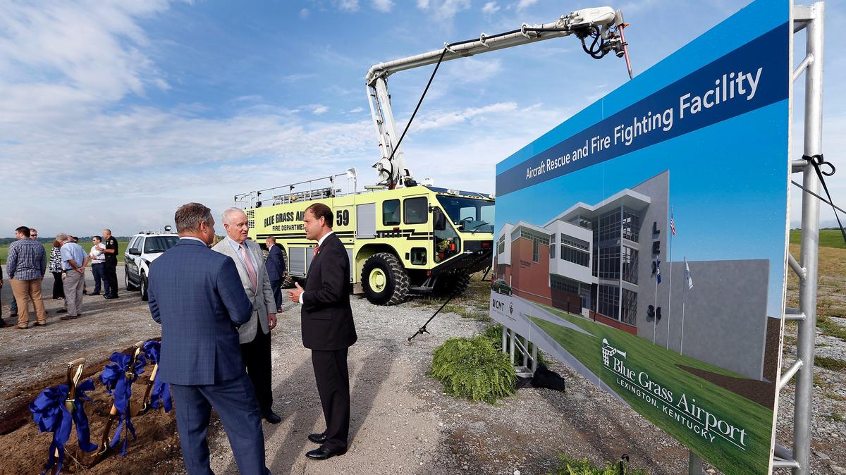 
Congressman Andy Barr, right, talked with Airport Executive Director Eric Frankl, left, and Lexington-Fayette Urban County Airport Board Chairman Van Alford, middle, after Blue Grass Airport officials broke ground Thursday morning for a new state-of-the-art $15 million aircraft rescue and firefighting facility. The new facility, which replaces the existing facility that was built in 1979 and is located 100 yards away, will be 23,196 square-feet. It will accommodate 18 full-time officers and will have 4 bays for aircraft rescue and firefighting vehicles.
