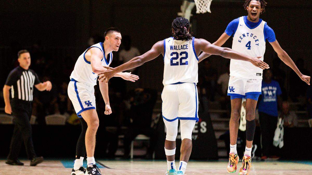 Kentucky basketball players CJ Fredrick (1), Cason Wallace (22) and Daimion Collins (4) celebrate during the Wildcats’ 108-56 victory over the Dominican Republic National Select Team on Wednesday, August 10, 2022. (Photo by Chet White | UK Athletics)