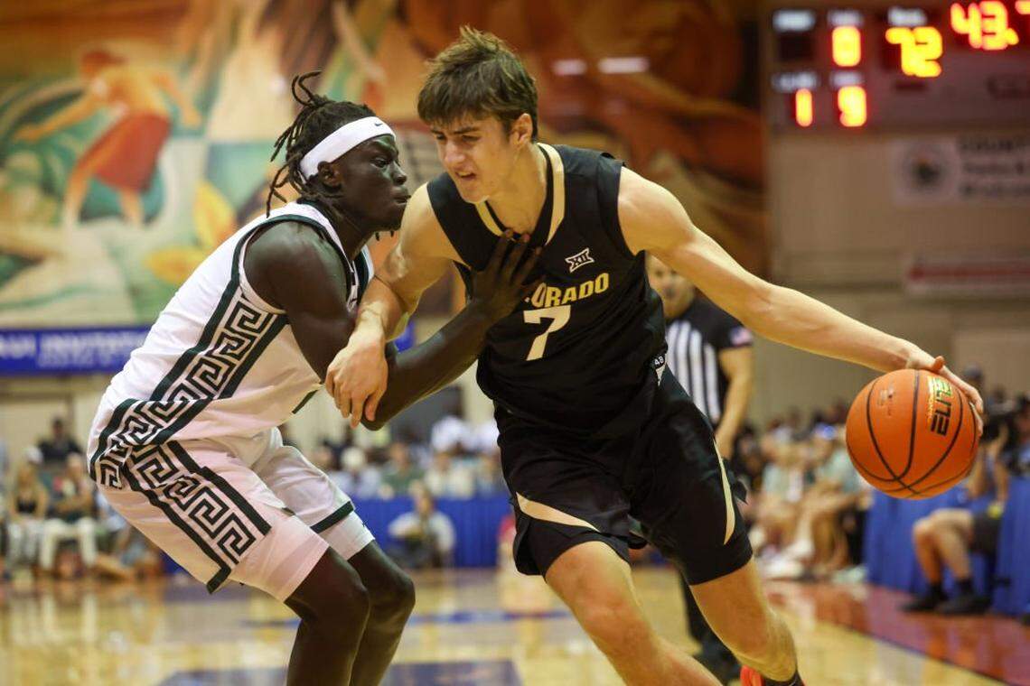 LAHAINA, HAWAII - NOVEMBER 25: Sebastian Rancik #7 of the Colorado Buffaloes attempts to get past Kur Teng #2 of the Michigan State Spartans during the second half of the Maui Invitational at the Lahaina Civic Center on November 25, 2024 in Lahaina, Hawaii. (Photo by Darryl Oumi/Getty Images)