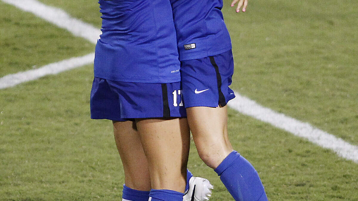 University of Kentucky women's soccer player Katy Keen, left, celebrates with teammate Courtney Raetzman after Keen's goal gave UK a 1-0 lead that would hold up for the eventual win over Louisville at The Bell on Friday, September 4, 2015, in Lexington, Ky.

Photo by Chet White | UK Athletics