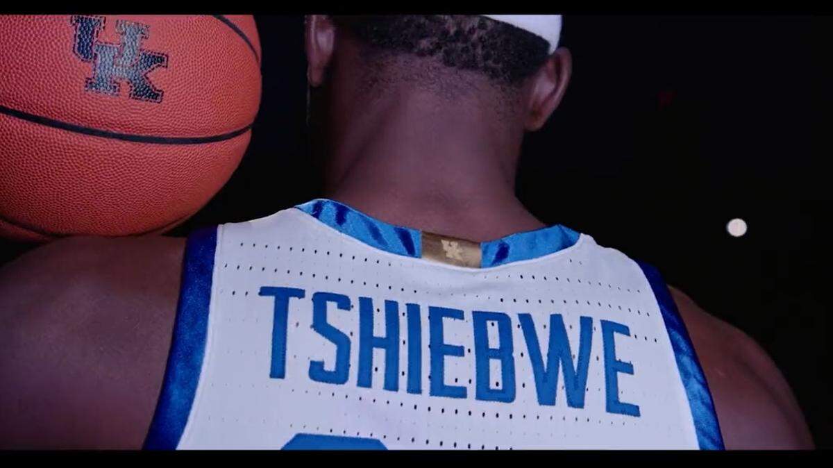 Oscar Tshiebwe wears the new Kentucky basketball jersey in a video released by UK on Tuesday.