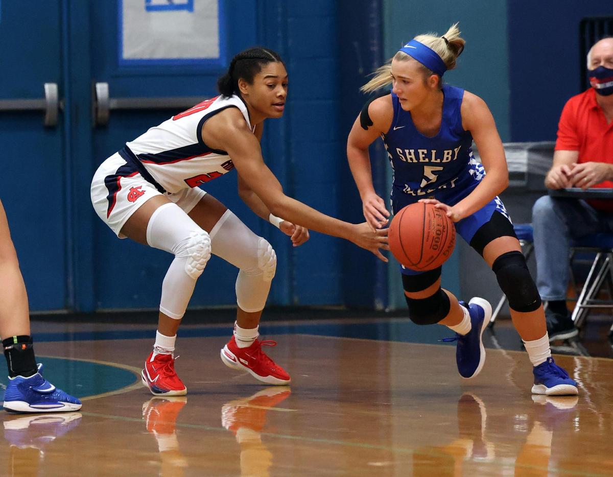 Anderson County’s Amiya Jenkins, left, guards Shelby Valley’s Cassidy Rowe (5) during a game in Lexington last December. Both players signed with Kentucky and will be college teammates next season.