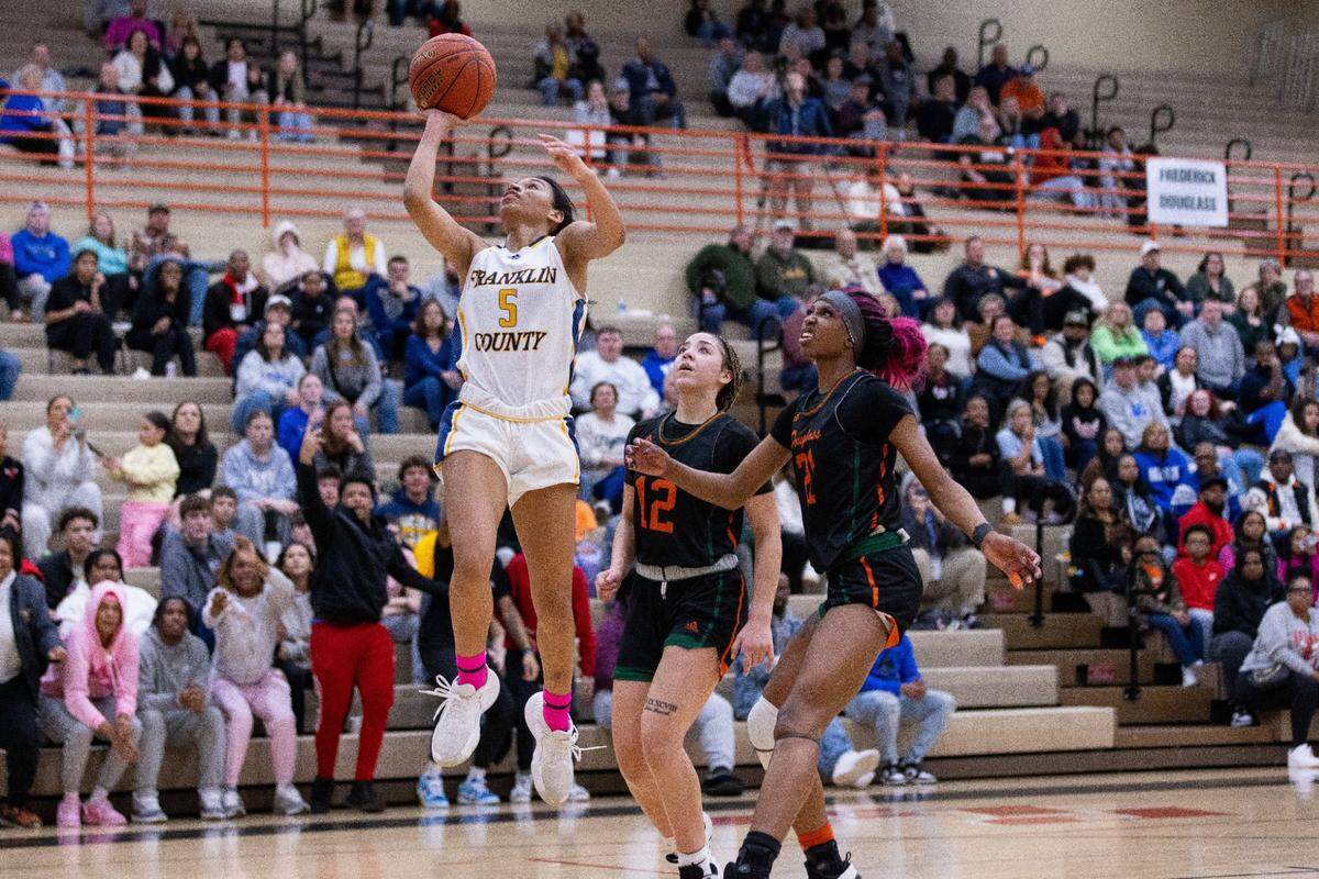 Franklin County’s Leia Hogan (5) scored 16 of her 19 points in the fourth quarter against Frederick Douglass in the 11th Region finals Saturday night.