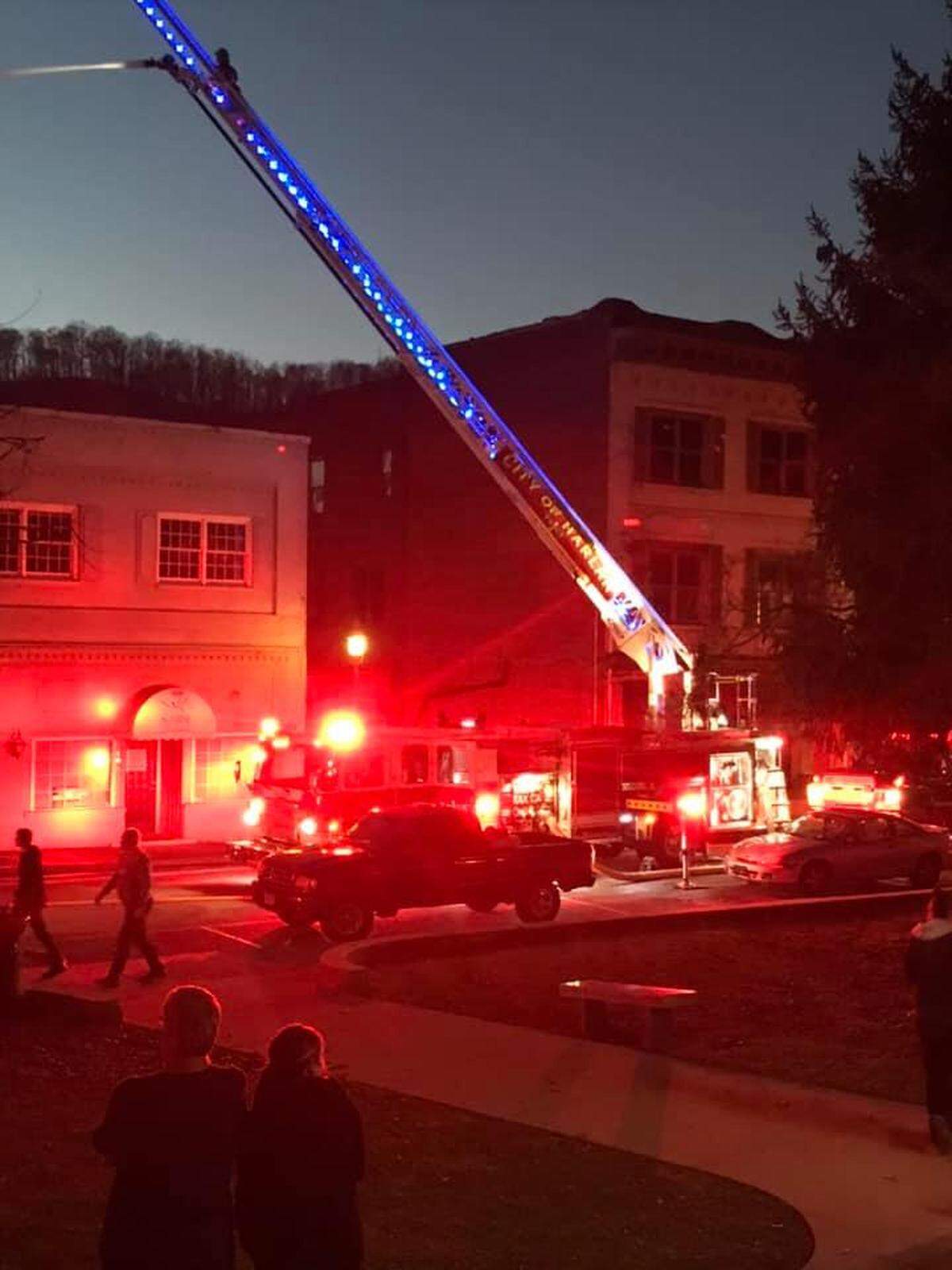 Police have charged a man with setting a fire that destroyed a building in downtown Harlan, Ky., on Nov. 28, 2020.