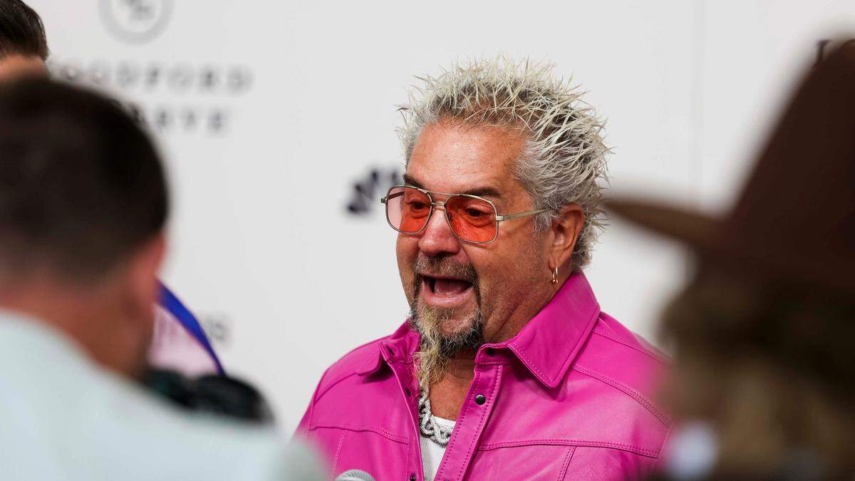 TV personality and chef Guy Fieri speaks to media at the Kentucky Derby Red Carpet on Saturday, May 3, 2025, at Churchill Downs in Louisville, Kentucky.