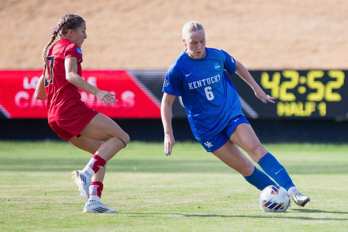 Kentucky women’s soccer sophomore defender Anna Sikorski dribbles the ball while playing against Louisville in an NCAA Tournament first-round match on Saturday at Lynn Stadium in Louisville.