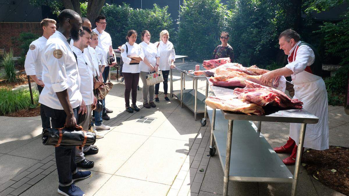 Proof that the “Top Chef” contestants started with some nice cuts of beef. But for most of them, it went downhill from here. From left, Eric Adjepong, Brandon Rosen, Eddie Konrad, Adrienne Wright, Brian Young, Michelle Minori, Sara Bradley, Kelsey Barnard, guest judge Nancy Silverton and Italian butcher Dario Cecchini.