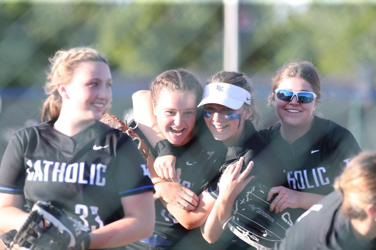 Lexington Catholic’s players celebrate their win against Great Crossing in Tuesday’s 11th Region semifinals.
