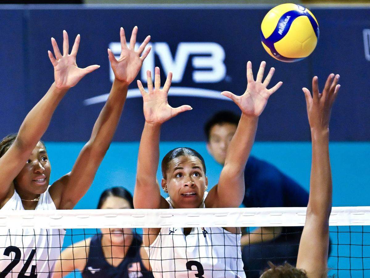 Former Kentucky star Avery Skinner (3) tried to block a spike by Celeste Plak (4) of the Netherlands during the USA Volleyball Cup at The Walter Pyramid. Skinner and Team USA defeated the Netherlands 3 -2 in a tuneup for the Paris Olympics.