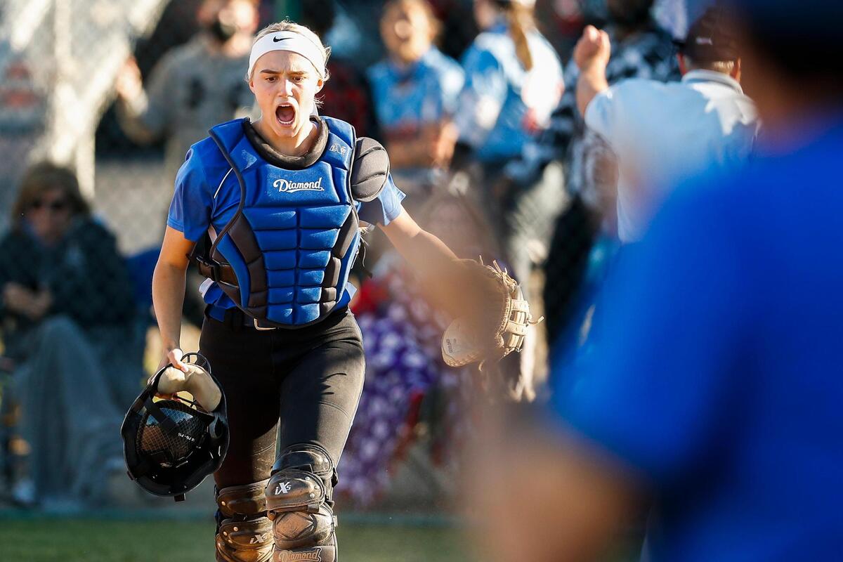 Lexington Catholic’s Ella Emmert (12) celebrated during a game against Lafayette on Thursday. The Knights won 3-0.
