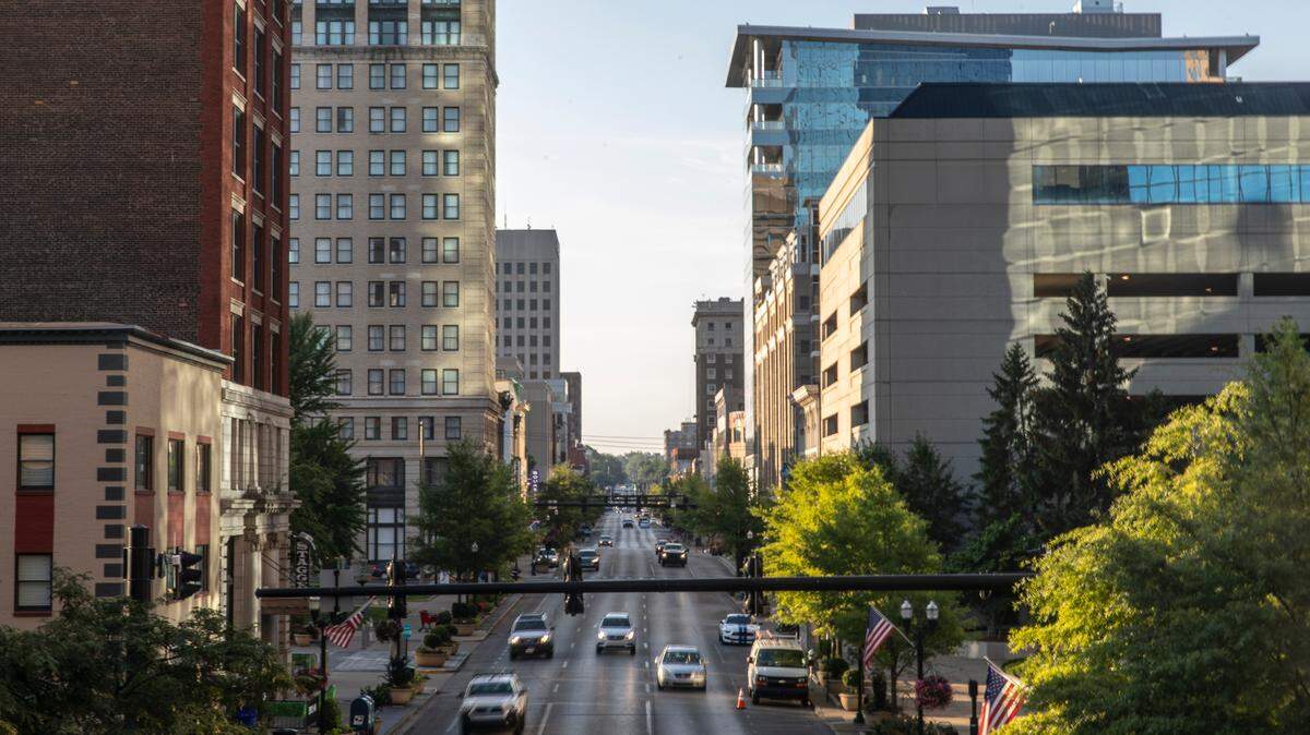Vehicles drive along West Main Street in downtown Lexington, Ky., on Friday, July 24, 2020.