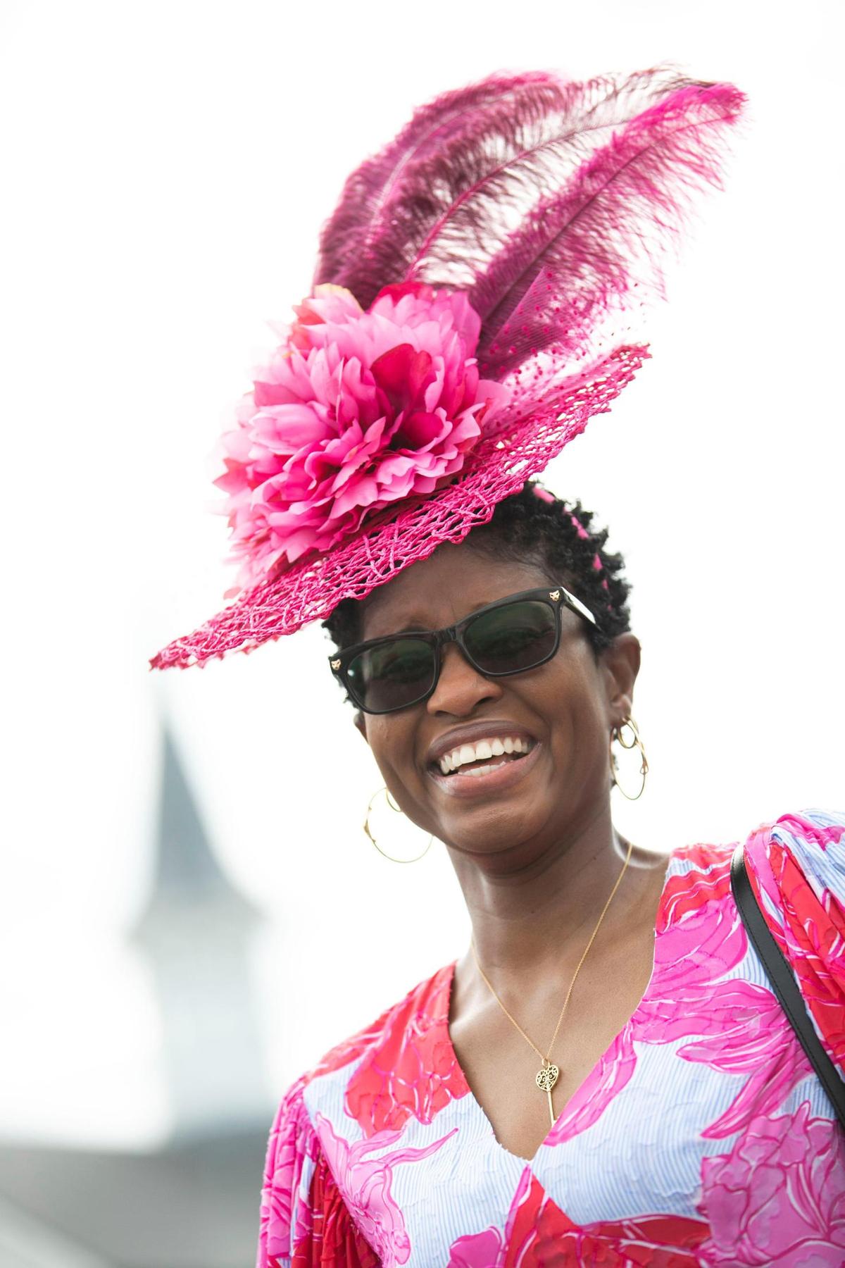 Tawanna Gillis is pretty in pink at Churchill Downs in Louisville, Ky., Saturday, May 6, 2023. Her fascinator came from the Mad Hatter, dress from Vineyard Vines and her necklace from Tiffany.