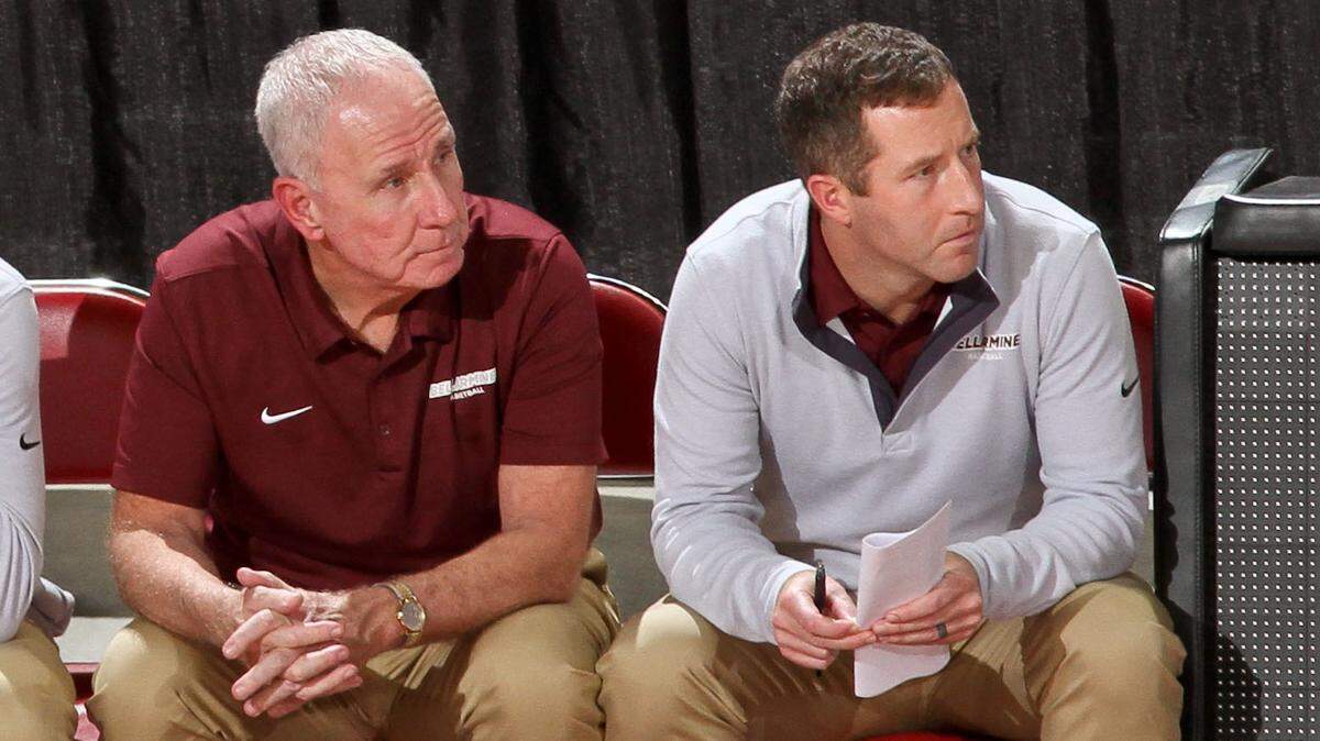 New Bellarmine men’s basketball coach Doug Davenport, right, is succeeding his father, Scott Davenport, left, as Knights head man. Scott Davenport won 426 games as Bellarmine coach from 2005 through 2025 and led the Knights to the 2011 NCAA Division II national championship and, as a NCAA Division I member, the 2022 ASUN Tournament title.