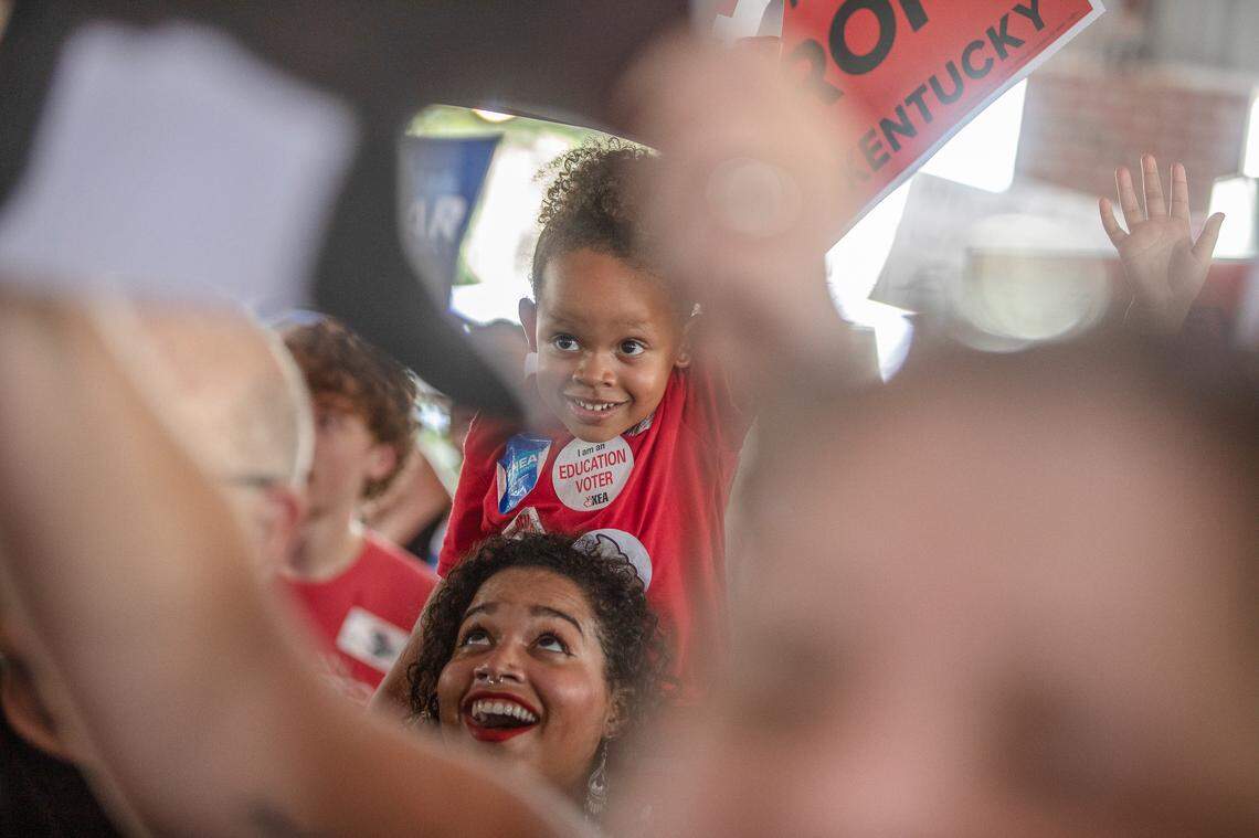 Supporters of Kentucky Attorney General Andy Beshear cheer during his speech at the Fancy Farm Picnic in Fancy Farm, Ky., Saturday, Aug. 3, 2019.