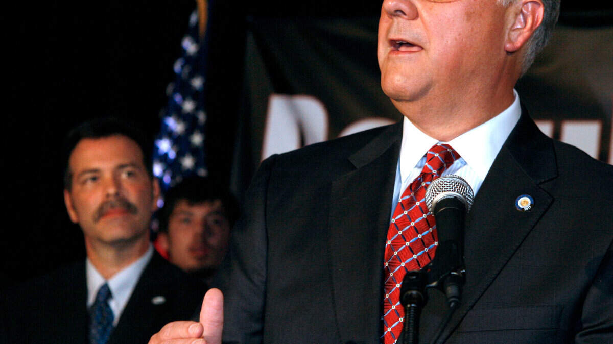 Republican candidate for Governor David Williams, right, gave his concession speech as his running mate for Lt. Governor, Richie Farmer, background left, listened on Tuesday, Nov. 8, 2011 at Griffin Gate Marriott Resort and Spa in Lexington, Ky.  Photo by David Perry | Staff