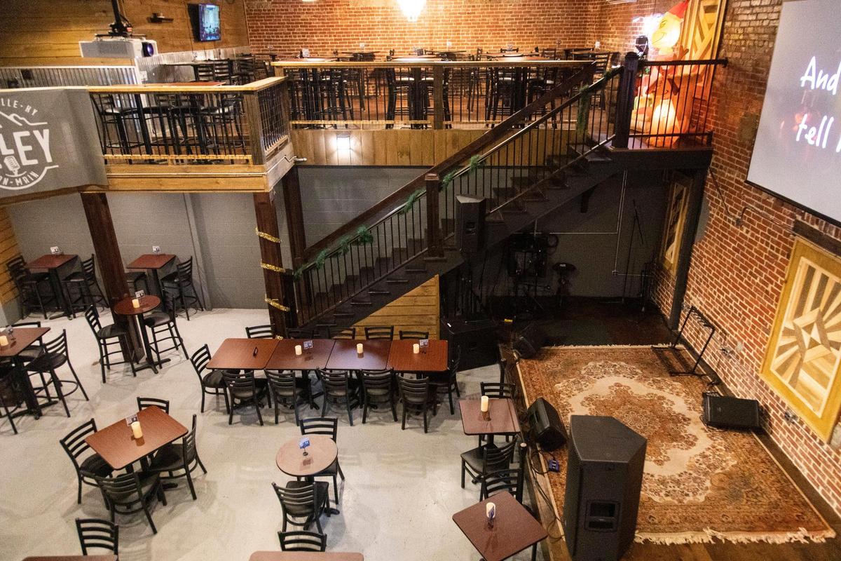 Part of the dining room and inside stage space at the Alley on Main in Paintsville, which has room for up to 300 people, features high ceilings, original brick walls, a second floor balcony and chandeliers for ambiance. They also serve food and drinks and plan to host a three-day music festival annually called the “Alley Fest.”