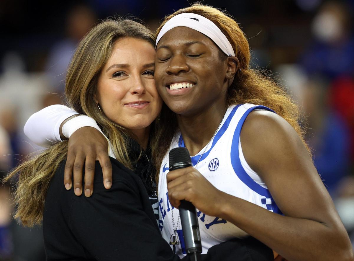 Kentucky’s Rhyne Howard, right, is hugged by teammate Blair Green after Sunday’s game.