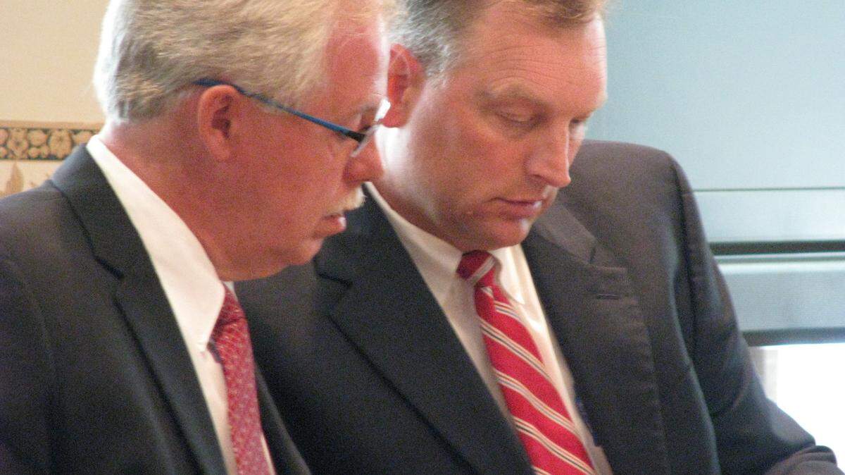 Former Woodford County Coroner Steve Ward, left, conferred with his attorney, Patrick Nash, in May 2012 before pleading guilty to one count of sexual misconduct, a misdemeanor, in Woodford Circuit Court. Ward was sentenced to a year in jail, but he received shock probation after serving four months. File photo by Greg Kocher | Staff