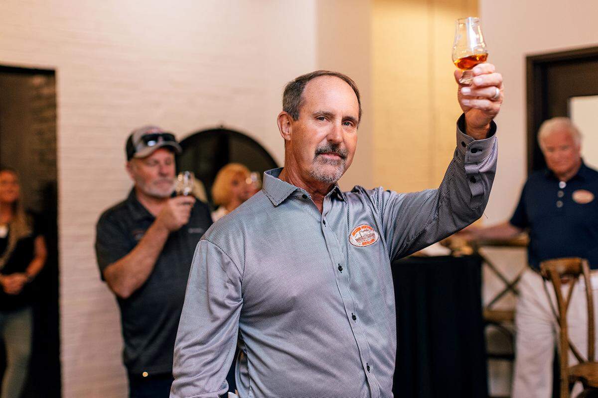 Jackson Purchase master distiller Craig Beam does a toast at a recent tasting event to launch his new bourbon, the first release from the Fulton County distillery. Beam was the former master distiller at Heaven Hill before he retired in 2014 to help care for his ailing father, the late master distiller emeritus Parker Beam, who died in 2017 of ALS.