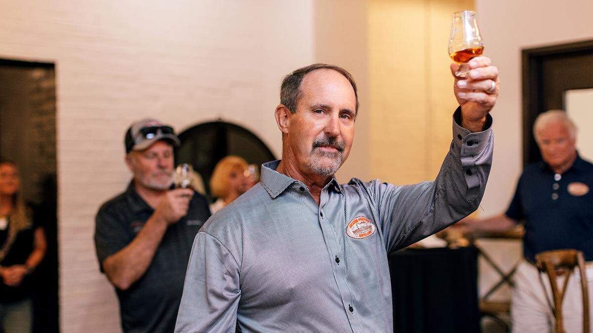 Jackson Purchase master distiller Craig Beam does a toast at a recent tasting event to launch his new bourbon, the first release from the Fulton County distillery. Beam was the former master distiller at Heaven Hill before he retired in 2014 to help care for his ailing father, the late master distiller emeritus Parker Beam, who died in 2017 of ALS.