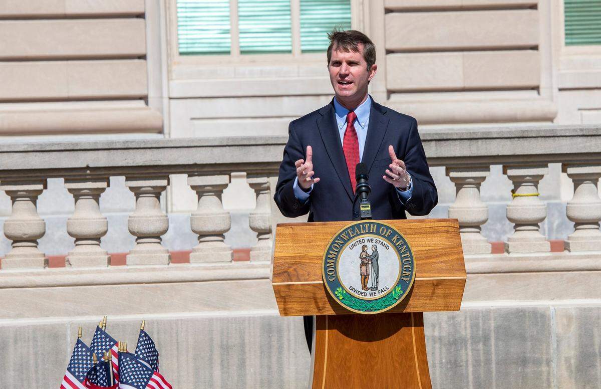 Gov. Andy Beshear spoke at a memorial Saturday outside the state Capitol to commemorate the one-year anniversary of COVID-19 in Kentucky.