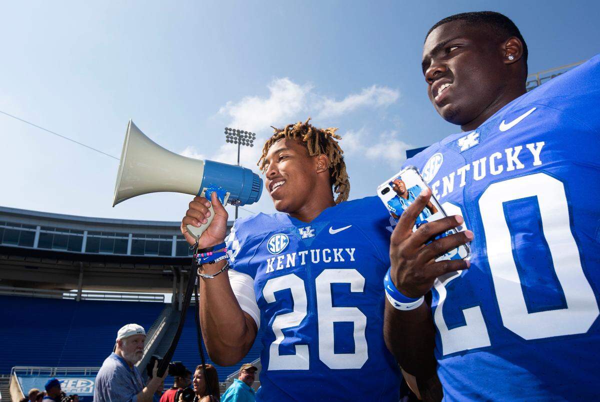 Junior running back Benny Snell tried to direct the Media Day festivities at the even on Aug. 3 at Kroger Field.