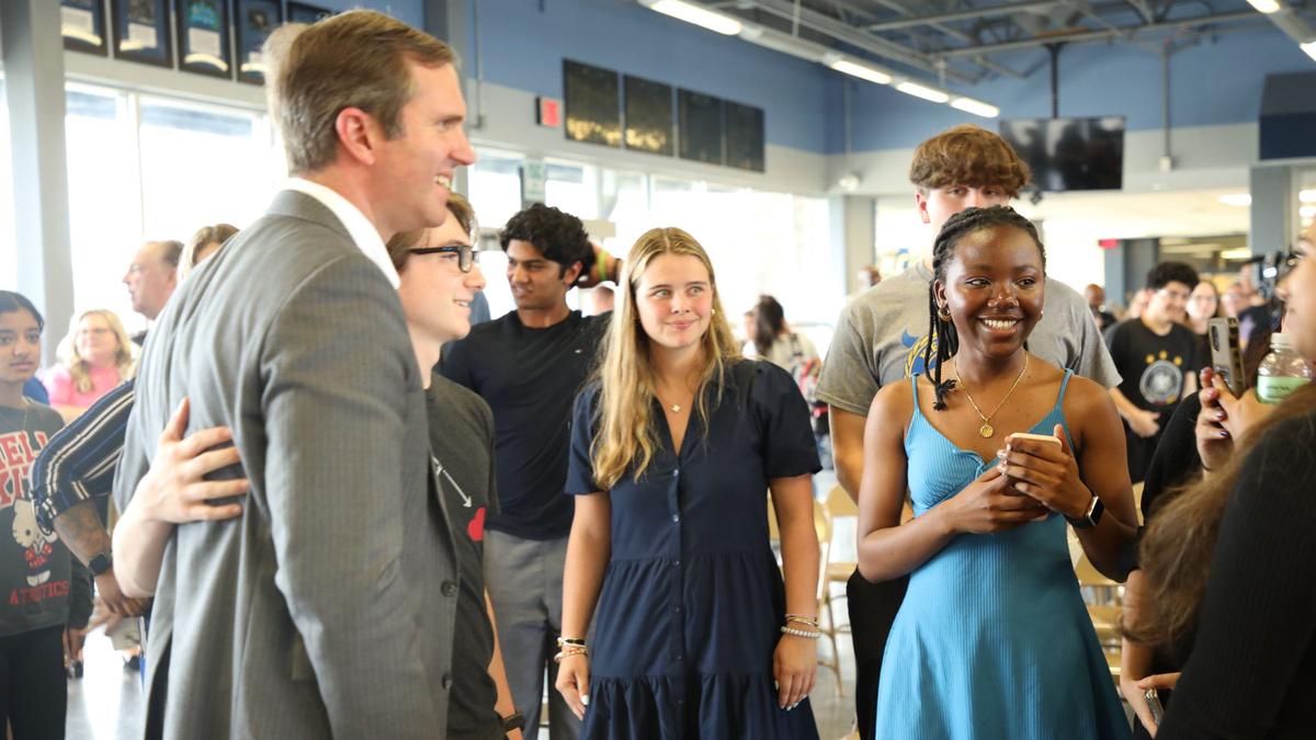 Kentucky Gov. Andy Beshear met with students personally and posed for photos after receiving the inaugural FCPS Distinguished Alumni Award at Henry Clay High School on May 24, 2024. Lexington, Ky
