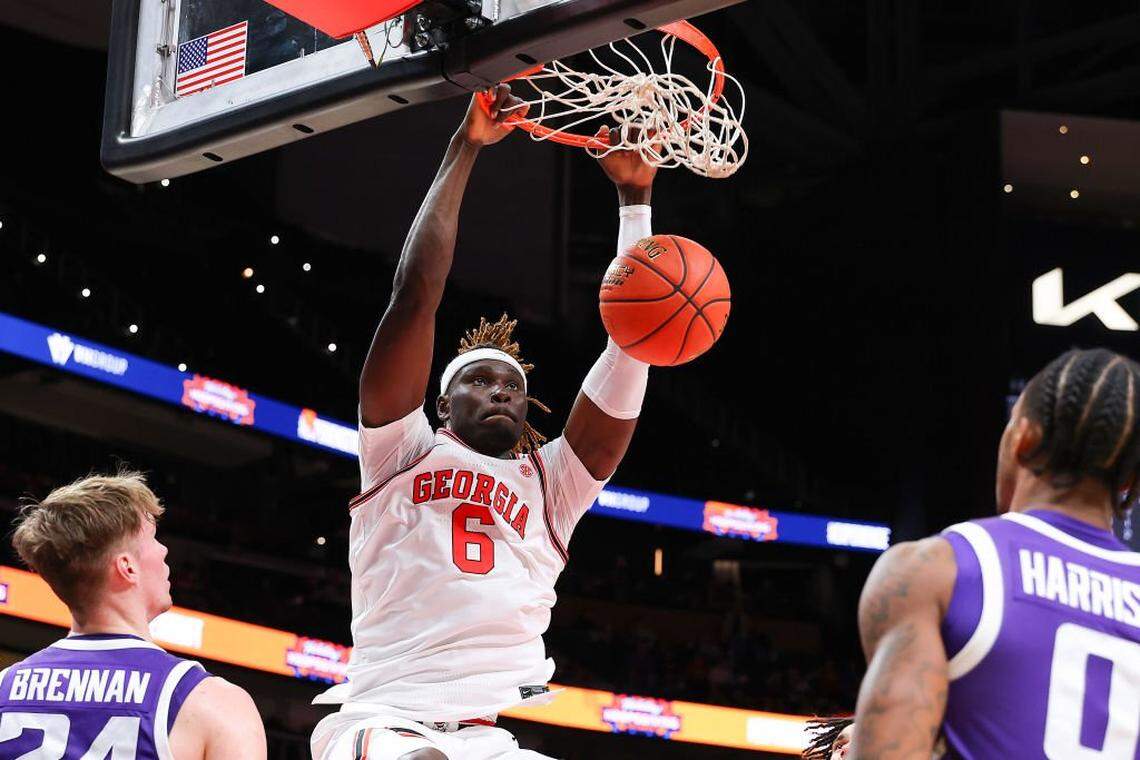 ATLANTA, GEORGIA - DECEMBER 14:  Somto Cyril #6 of the Georgia Bulldogs dunks the ball against the Grand Canyon Antelopes during the first half in the Holiday Hoopsgiving Atlanta at State Farm Arena on December 14, 2024 in Atlanta, Georgia. (Photo by Kevin C. Cox/Getty Images)