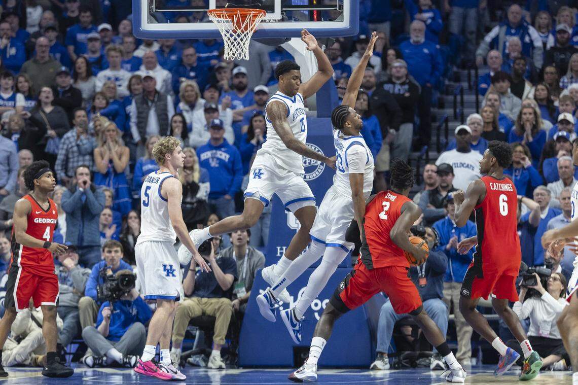 Georgia center Somto Cyril (2) looks to shoot as Kentucky forwards Brandon Garrison (10) and Mouhamed Dioubate (23) defend during a game at Rupp Arena on Tuesday.