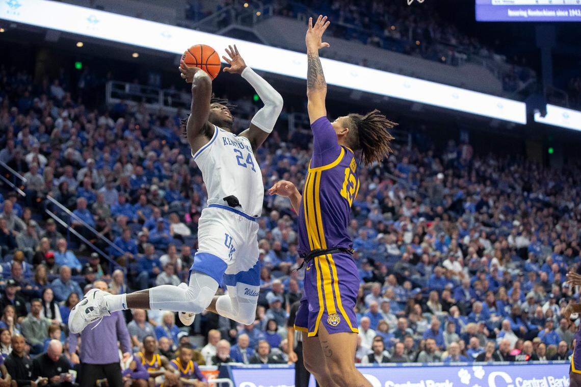 Kentucky’s Chris Livingston (24) puts up a shot against LSU’s Jalen Reed (13) on Tuesday night. Livingston finished with five points.