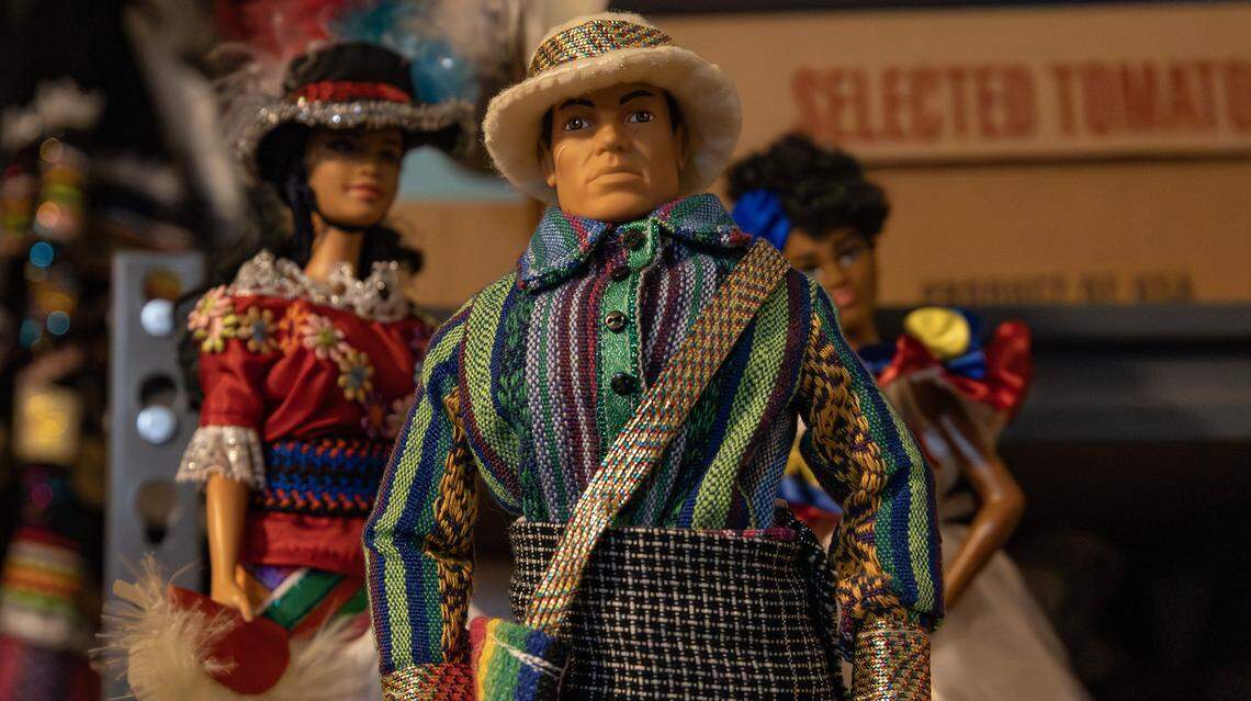 Local artist and activist fashion designer, Soreyda Benedit Begley, uses older model GI Joe action figures to mimic the robust build of Afro-Latino men when creating male dolls on Jan. 21, 2026, in Lexington, Ky.