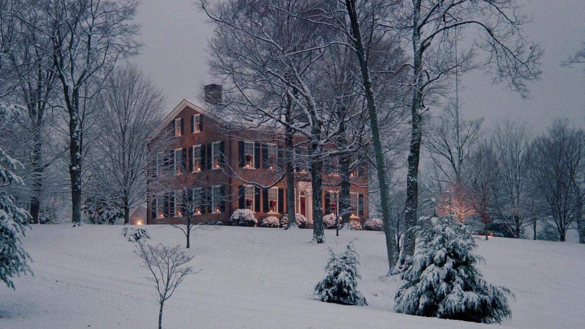 My Old Kentucky Home State Park's mansion is decorated with garlands, holly berries, candles and a tree in the parlor.  