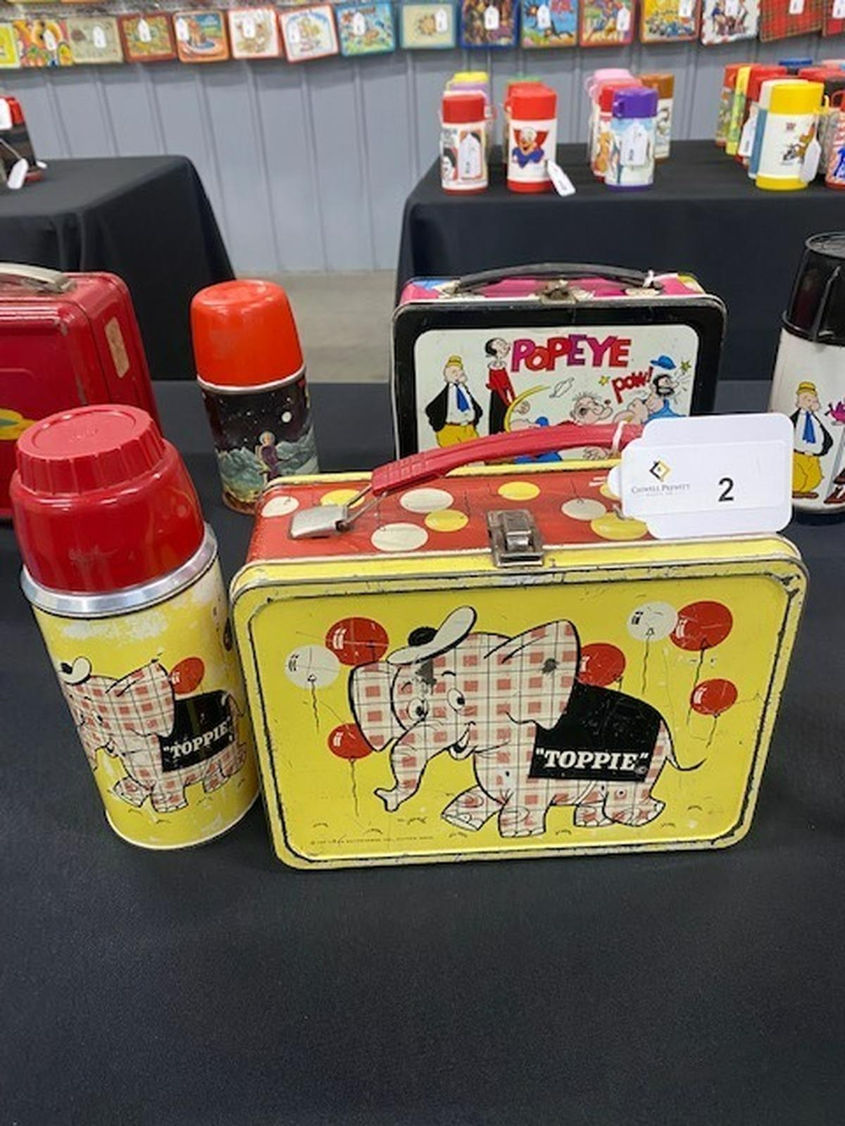 “Toppie the Elephant” lunchbox has drawn interest from collectors, with bids over $2,000 as of Thursday. It’s a rare Top Value stamps collectible in the Caswell Prewitt Auction.