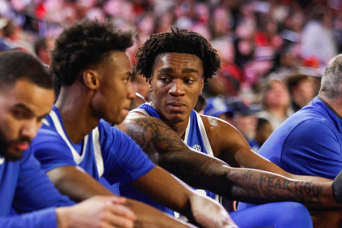 Kentucky starters Jaxson Robinson, left, and Amari Williams, right, combined to score seven points and both battled foul trouble Tuesday night.