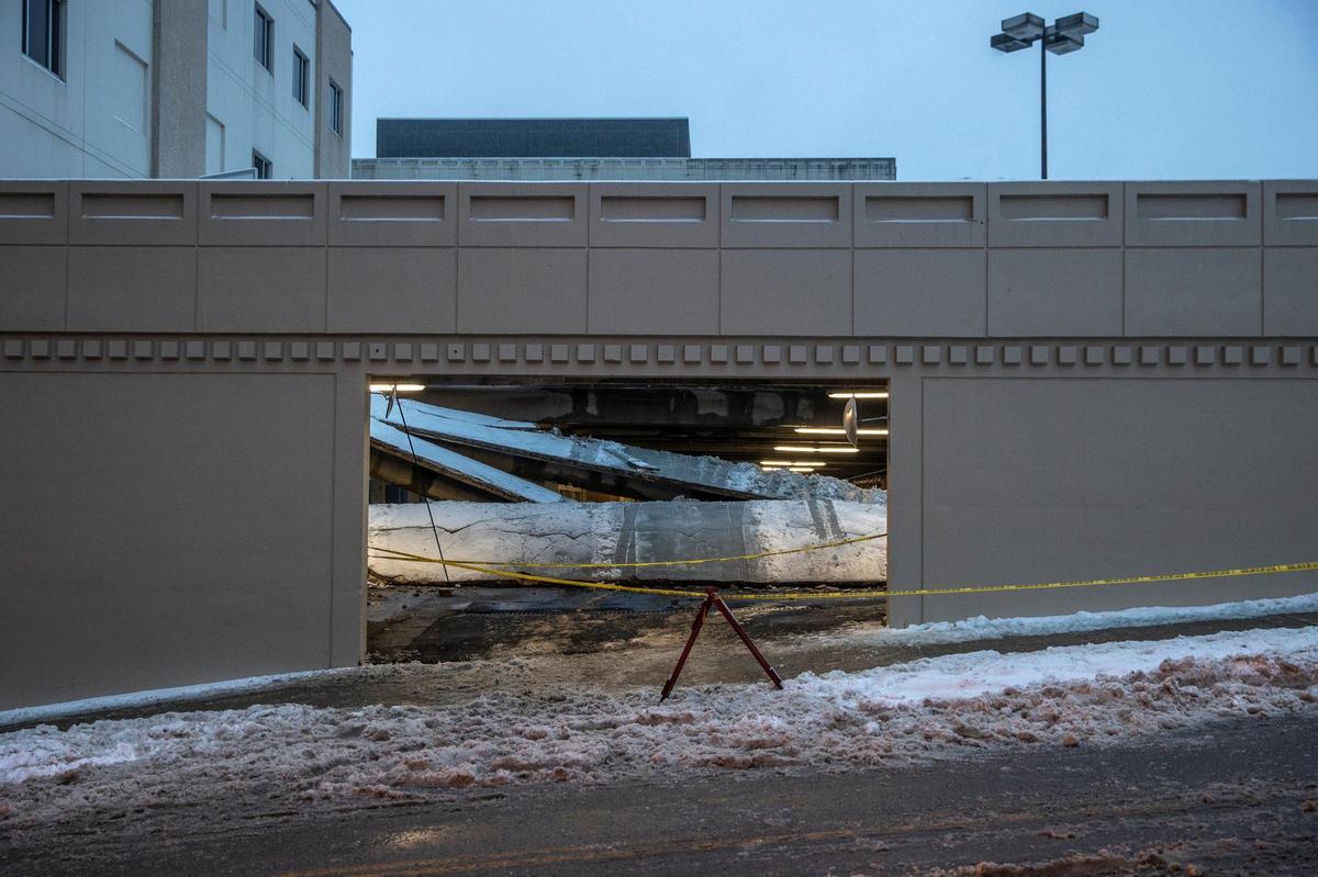 A parking garage partially collapsed near South Mill and West High streets in Lexington, Ky., on Thursday, Feb. 18, 2021.