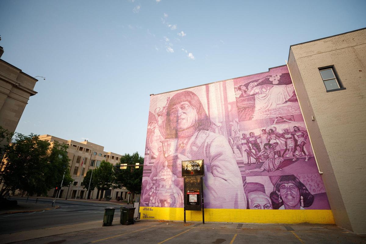 The morning sun hits a mural of Sweet Evening Breeze on Friday, June 17, 2022, at the corner of Church Street and North Limestone in Lexington, Kentucky.