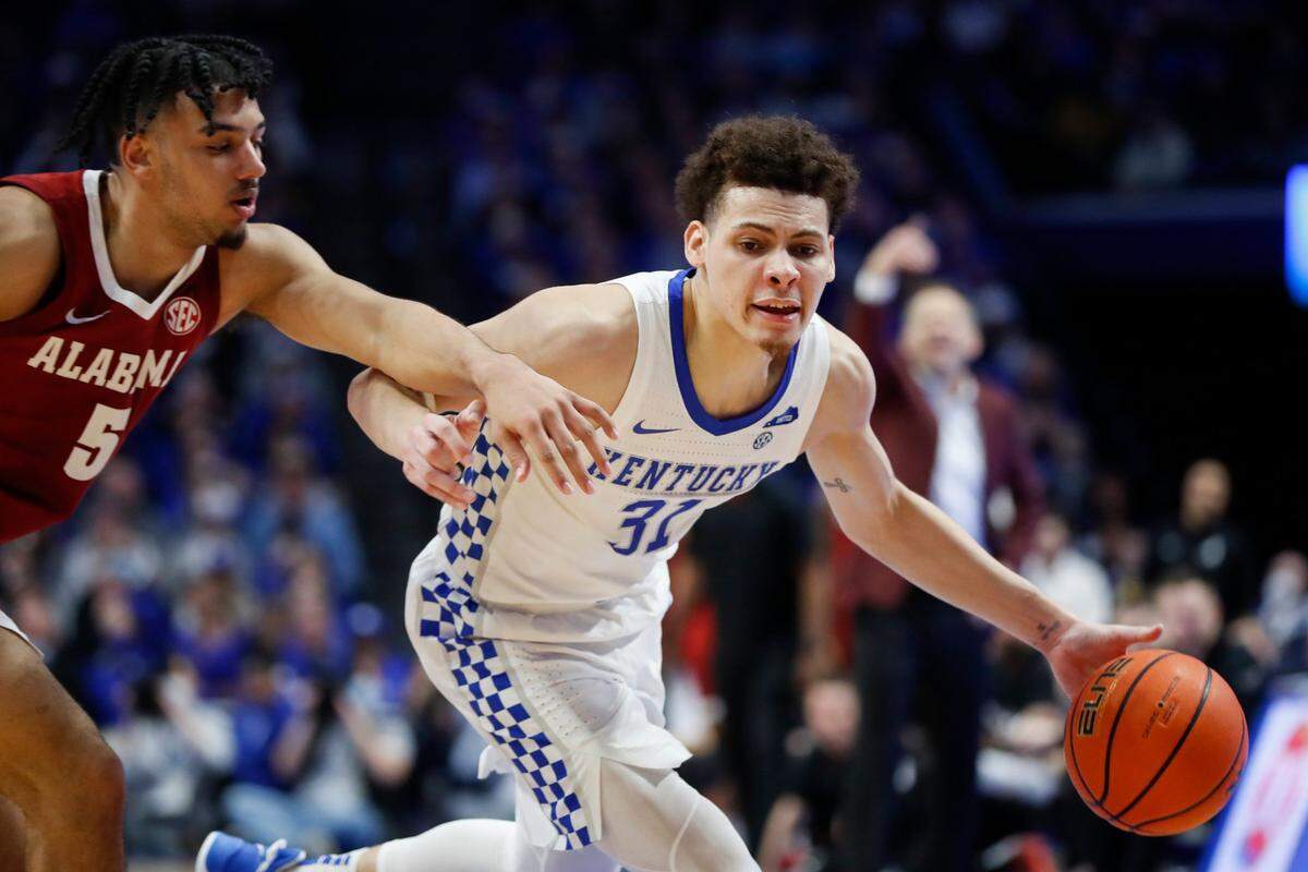With injuries sidelining point guards Sahvir Wheeler and TyTy Washington, Kellan Grady (31) shifted to the “one position” and led UK to a 90-81 win over Alabama while also scoring 25 points.