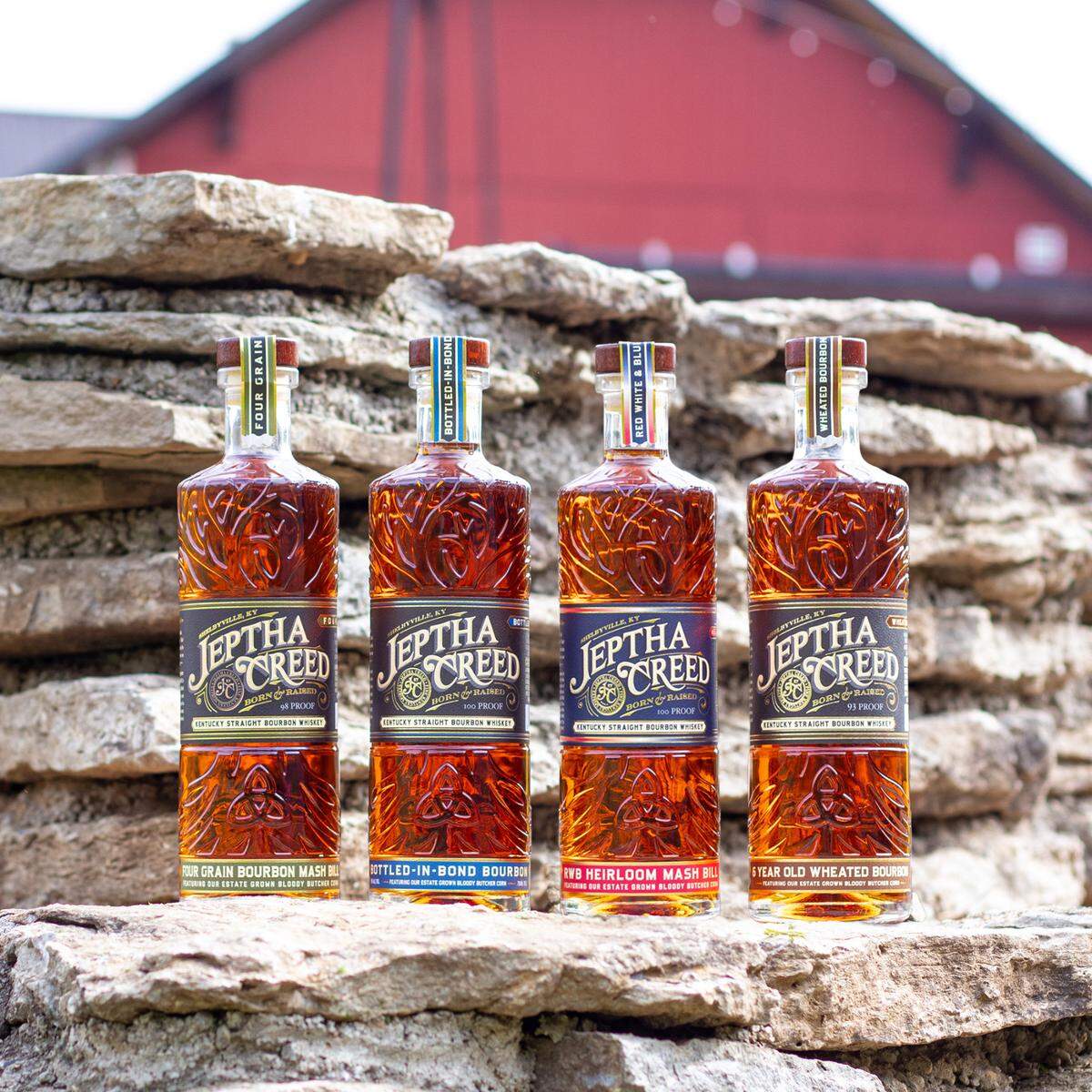 All four Jeptha Creed bourbons, including Red, White & Blue, which is made with red, white and blue corns.