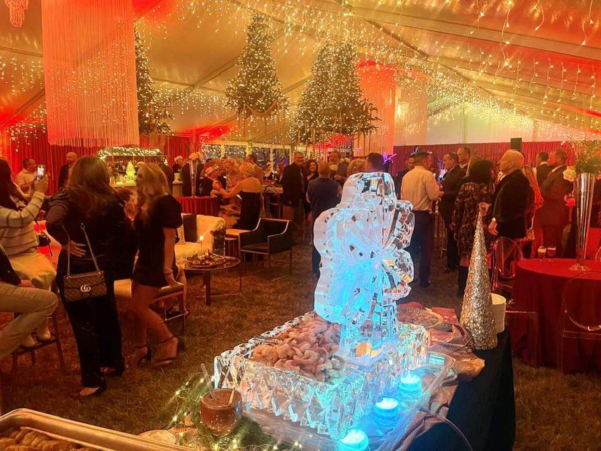 A holiday event catered by Seasons Catering in 2023 featured snowflake ice sculptures and lighted Christmas trees suspended from the ceiling of the tent. Owner Kellie Stoddart said that all the clients from 2023 had booked again for 2024 as well as new ones so her company is busier than ever.
