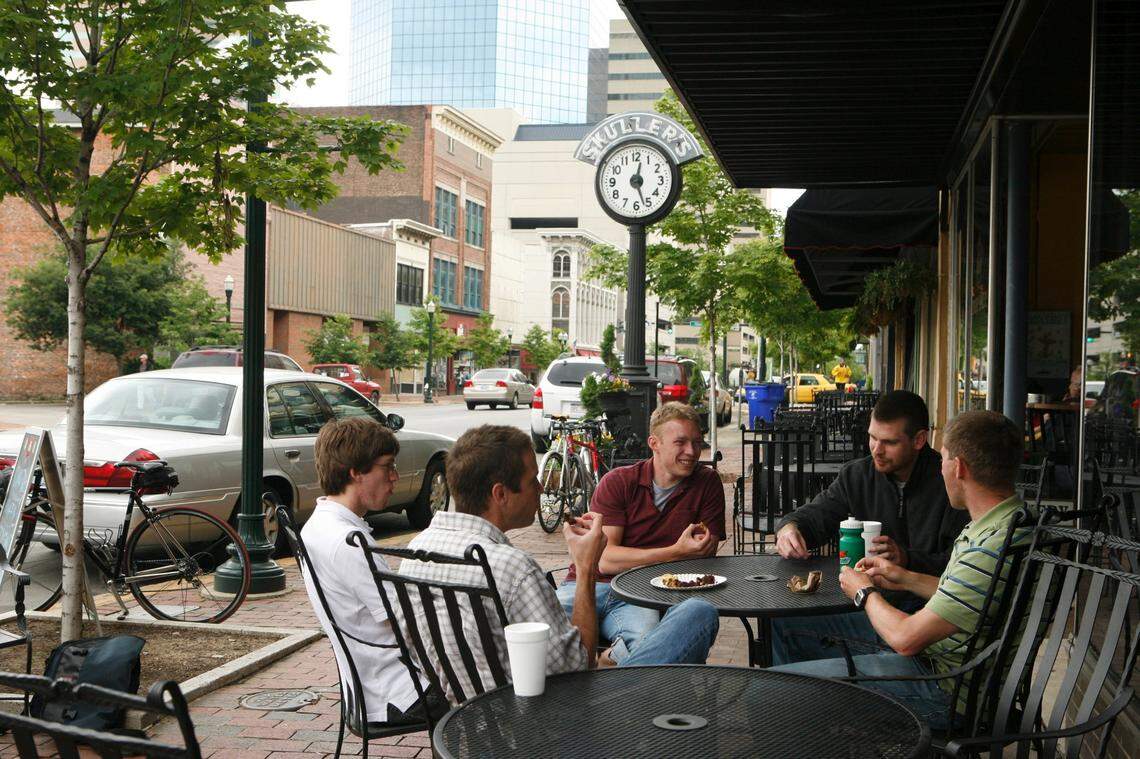 Workers from Lexmark rode their bikes to lunch at Sunrise Bakery on Main Street in 2008. The cafe was open for lunch some weekdays and for brunch on Saturday. It won’t be reopening, said co-owner Kristy Matherly. But the bakery still delivers wholesale bread and other baked goods.