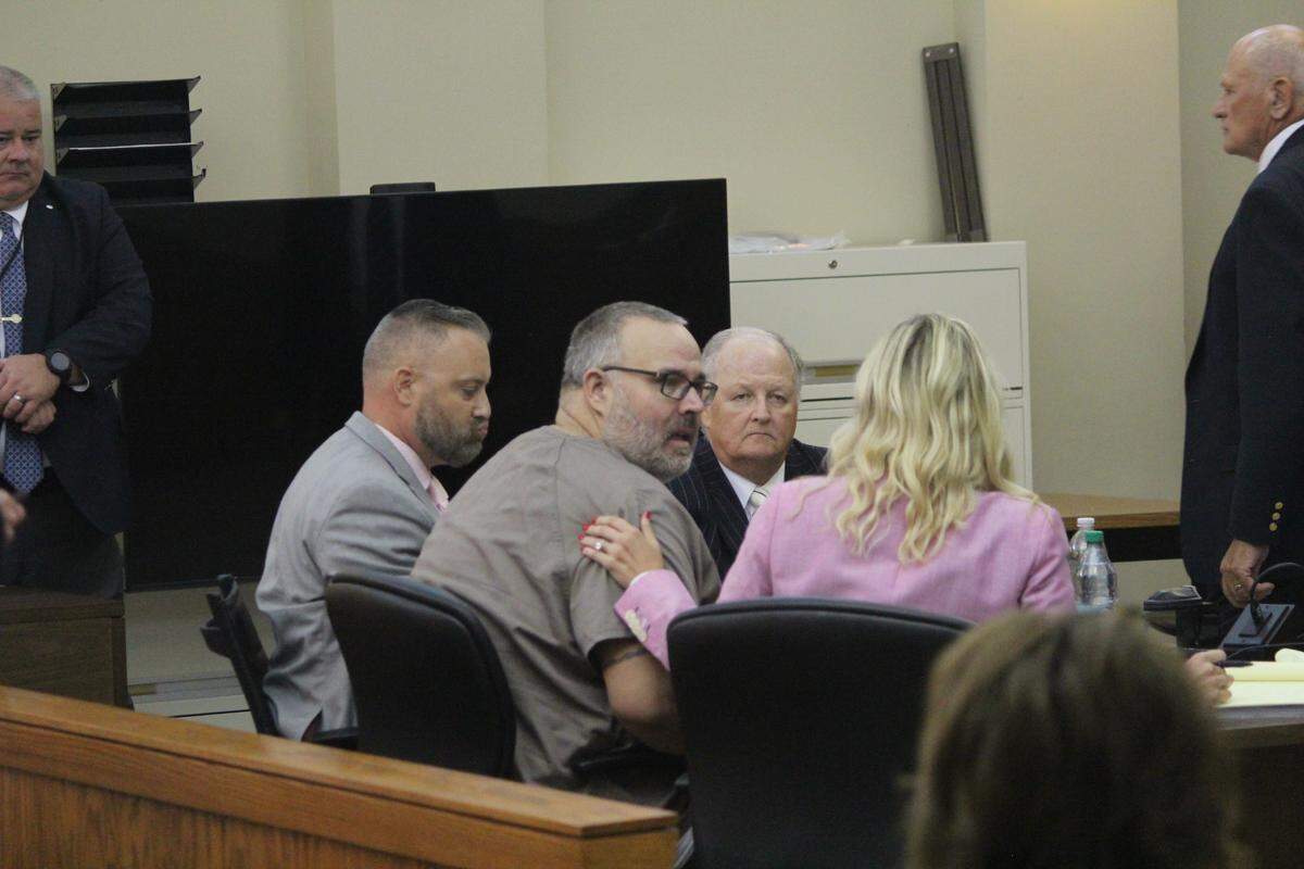 Shawn “Mickey” Stines sits with his attorneys during a hearing at the Letcher County Courthouse on Aug. 15, 2025.