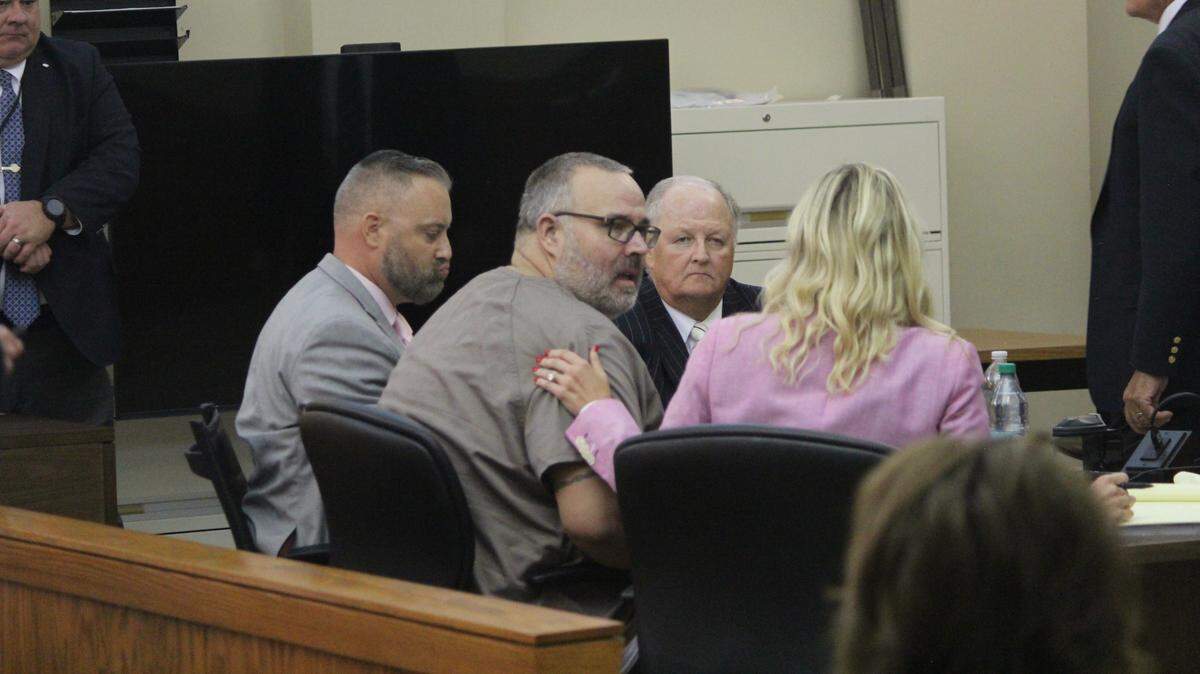 Shawn “Mickey” Stines sits with his attorneys during a hearing at the Letcher County Courthouse Aug. 15, 2025.