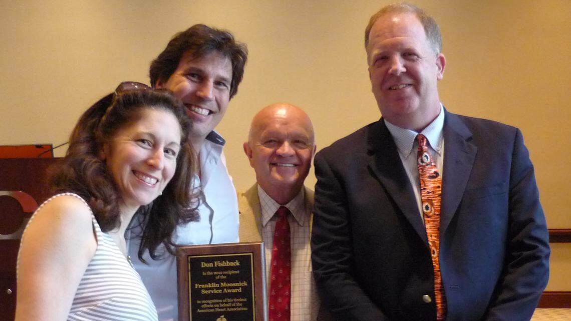 Dr. Sylvia Cerel-Suhl, left, and Don Fishback, second from left, were honored recently by the American Heart Association for their leadership and service. With them were Joey Maggard, right, executive director of the Central Kentucky chapter of AHA, and Ron Borkowski, chairman of the chapter's executive committee.   