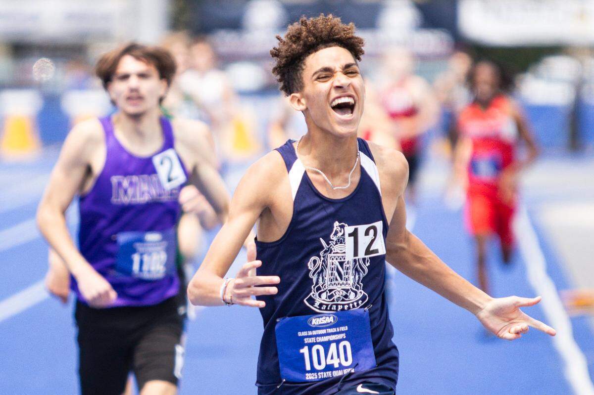 Lafayette’s Xavier Richardson celebrates after winning the boys 800 meters at the Class 3A meet.