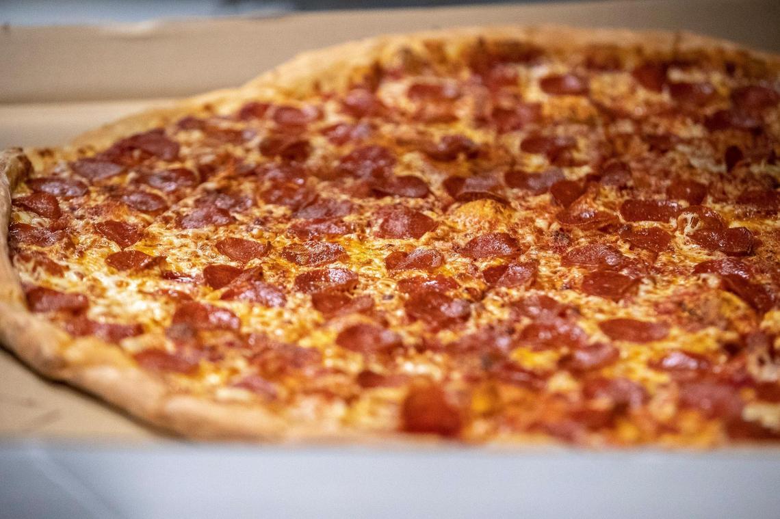 As Lexington's largest pizza, the Big Bambino from Big City Pizza takes up the entire pizza oven for a good 10 minutes while it bakes. 