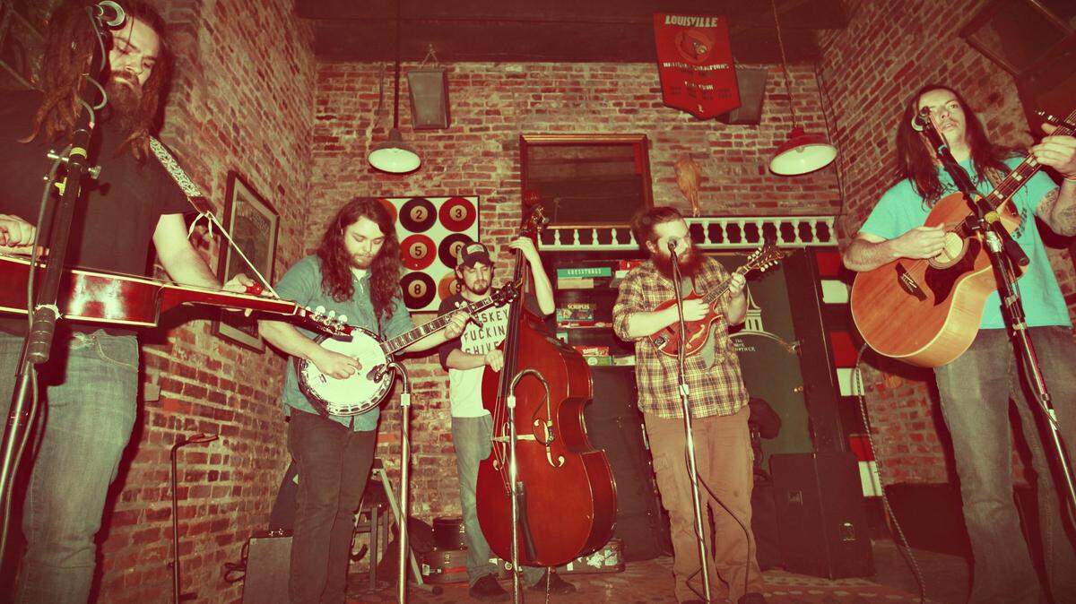 Dark Moon Hollow is (left to right): “Trigger” Trey Reinhart on vocals/guitar/dobro, Thomas Keathley on banjo, David Fish on bass and Brett Horton on vocals/guitar.