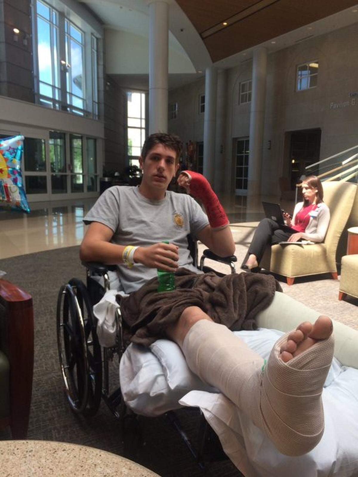 Chase Taulbee sat in the University of Kentucky Hospital a short time after the utility terrain vehicle accident that broke a bone in each of his lower legs in 2017. Taulbee broke his hand a week earlier playing football.